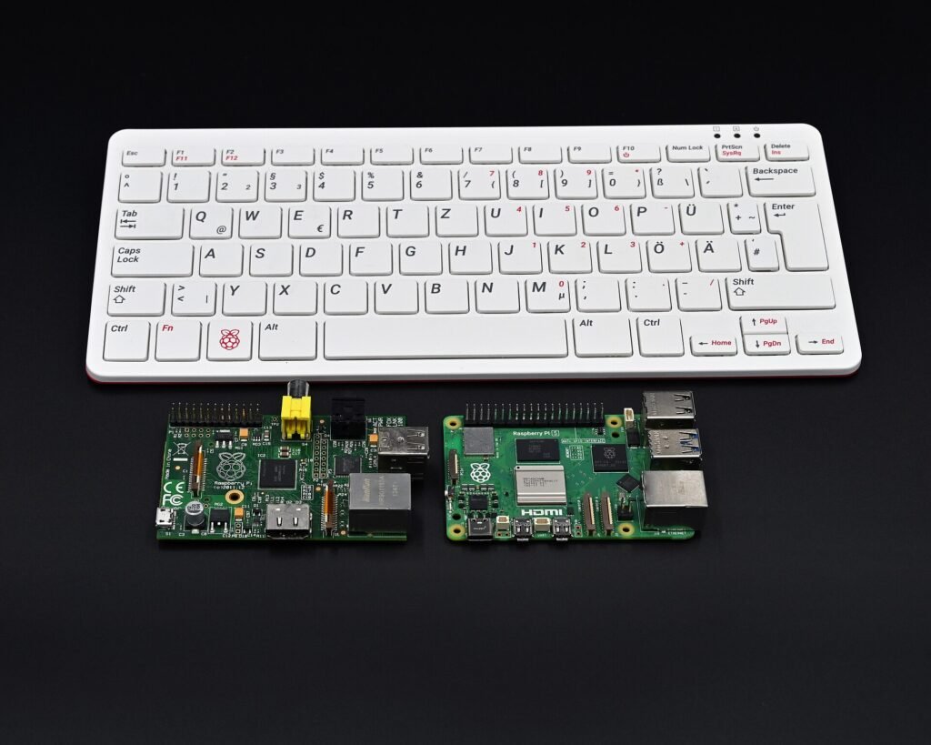 Raspberry Pi 1, Pi 400 and Pi 5.jpg